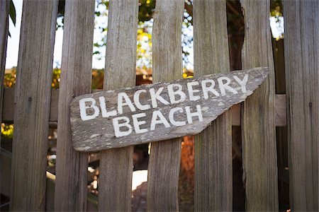 simsearch:600-03696739,k - Sign Pointing towards Blackberry Beach on Orcas Island, San Juan Islands, Washington, USA Stock Photo - Premium Royalty-Free, Code: 600-03696740