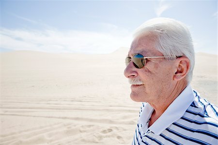 simsearch:700-03686142,k - Portrait of Man in the Desert, Imperial Sand Dunes Recreation Area, California, USA Stock Photo - Premium Royalty-Free, Code: 600-03696923