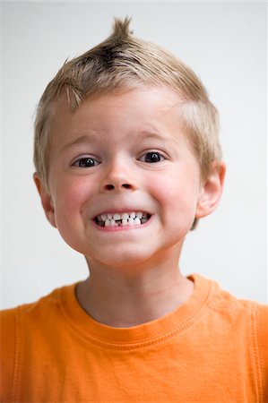 Portrait of Boy with Missing Tooth, Salzburg, Salzburger Land, Austria Stock Photo - Premium Royalty-Free, Code: 600-03720020