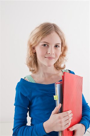 Teenager with Schoolwork Stock Photo - Premium Royalty-Free, Code: 600-03734635