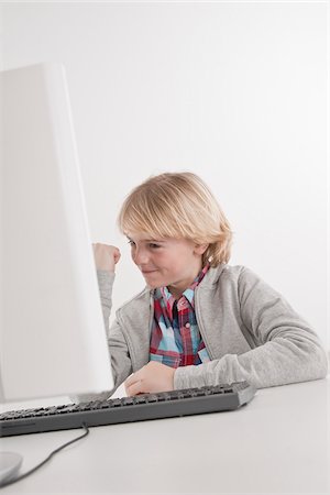 Teenager using Computer Stock Photo - Premium Royalty-Free, Code: 600-03734630