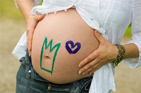 Close-up of Pregnant Woman's Belly, Salzburg, Austria Stock Photo - Premium Royalty-Free, Code: 600-03768667