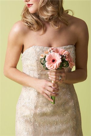 simsearch:600-03783424,k - Bride Holding Bouquet Stock Photo - Premium Royalty-Free, Code: 600-03775695