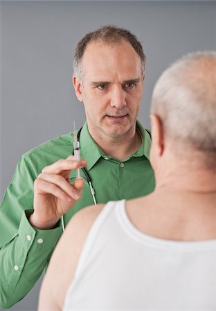 Doctor and Patient Stock Photo - Premium Royalty-Free, Code: 600-03777837