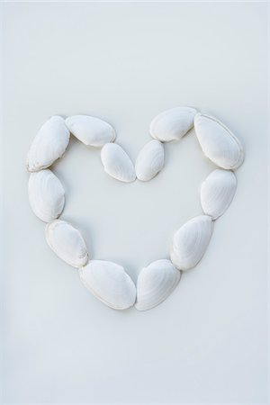 Seashells in the Shape of a Heart Foto de stock - Sin royalties Premium, Código: 600-03782479