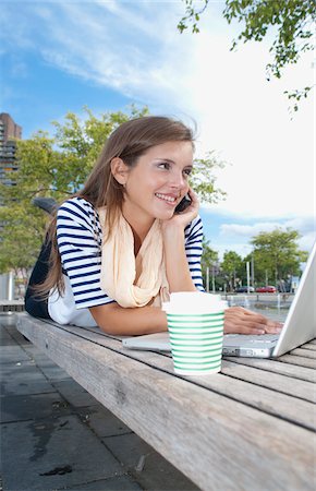 simsearch:700-06553291,k - Young Woman Using Laptop Computer Stock Photo - Premium Royalty-Free, Code: 600-03799516