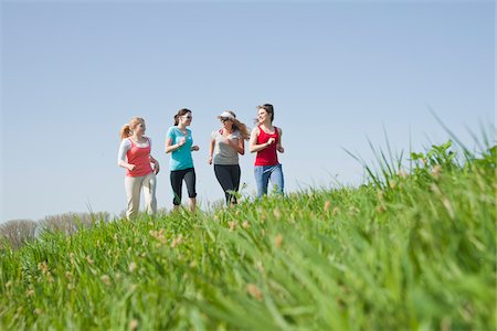 Young Women Jogging Stock Photo - Premium Royalty-Free, Code: 600-03814751