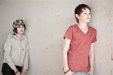 sad teenager girl - Boy and Girl Leaning on Wall Stock Photo - Premium Royalty-Free, Code: 600-03836163