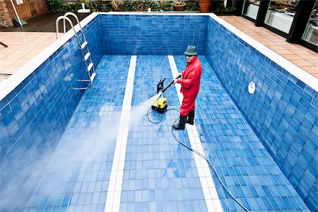 seniors at the pool - Man Cleaning Swimming Pool, Germany Stock Photo - Premium Royalty-Free, Code: 600-03836408