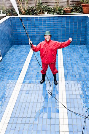 seniors at the pool - Man Cleaning Swimming Pool, Germany Stock Photo - Premium Royalty-Free, Code: 600-03836411