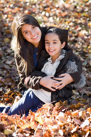 Portrait of Sisters in Autumn Stock Photo - Premium Royalty-Free, Code: 600-03848752