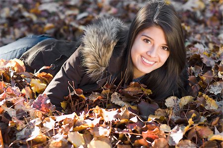 fall leaves teenagers - Portrait of Teenager in Autumn Stock Photo - Premium Royalty-Free, Code: 600-03848753