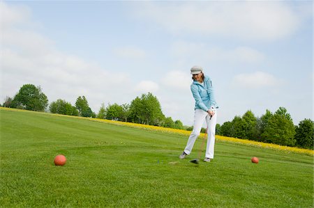 Woman Golfing, Berchtesgaden, Berchtesgadener Land, Oberbayern, Bavaria, Germany Stock Photo - Premium Royalty-Free, Code: 600-03848833