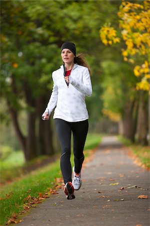 running in the fall - Woman Jogging through Park, Seattle, Washington, USA Stock Photo - Premium Royalty-Free, Code: 600-03849031