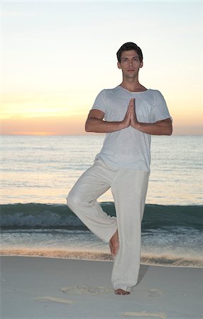 Man in Tree Pose, Reef Playacar Resort and Spa Hotel, Playa del Carmen, Quintana Roo, Yucatan Peninsula, Mexico Stock Photo - Premium Royalty-Free, Code: 600-03849068