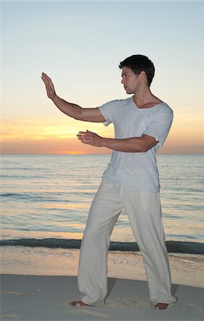 simsearch:600-02121195,k - Man Practicing Tai Chi, Reef Playacar Resort and Spa Hotel, Playa del Carmen, Quintana Roo, Yucatan Peninsula, Mexico Stock Photo - Premium Royalty-Free, Code: 600-03849069