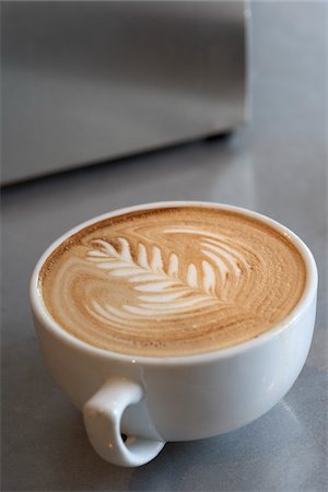 Latte with Designs in Foam Stock Photo - Premium Royalty-Free, Code: 600-03849256