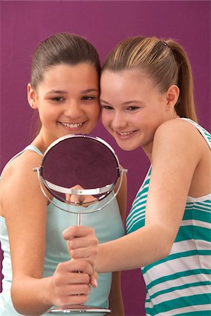 simsearch:600-03777750,k - Girls Looking in Mirror Stock Photo - Premium Royalty-Free, Code: 600-03849464