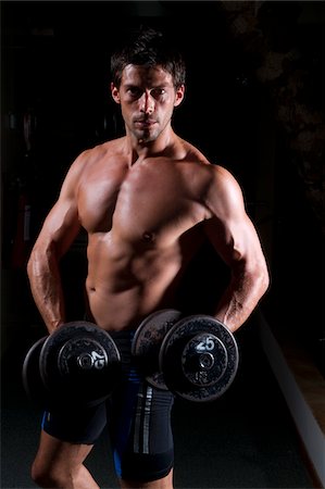 Man Working Out, Reef Playacar Resort and Spa Hotel, Playa del Carmen, Quintana Roo, Yucatan Peninsula, Mexico Stock Photo - Premium Royalty-Free, Code: 600-03849645