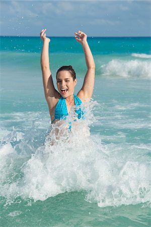 simsearch:600-05947909,k - Woman in Ocean, Reef Playacar Resort and Spa, Playa del Carmen, Mexico Stock Photo - Premium Royalty-Free, Code: 600-03849714