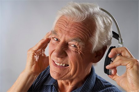 Man Listening to Music Stock Photo - Premium Royalty-Free, Code: 600-03865076