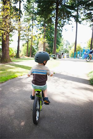 Boy Riding Bicycle, Washington Park, Portland, Oregon, USA Stock Photo - Premium Royalty-Free, Code: 600-03865195