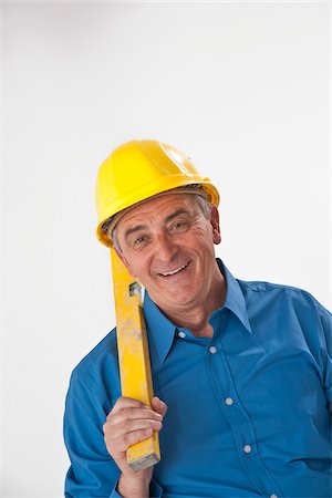 simsearch:600-03891199,k - Man Holding Carpenter's Level Stock Photo - Premium Royalty-Free, Code: 600-03893389