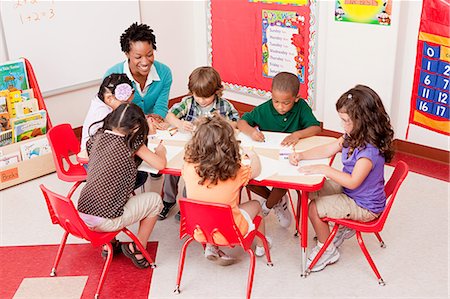 preschool girl - Teacher and children in school art class Stock Photo - Premium Royalty-Free, Code: 614-05523146