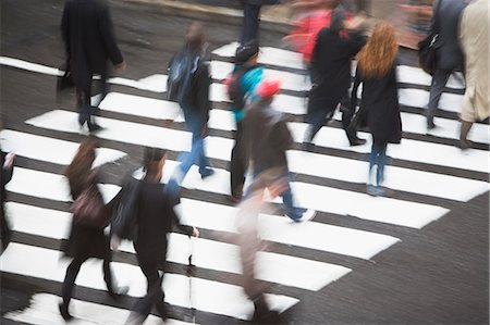 people walking in the street - Pedestrians crossing road Stock Photo - Premium Royalty-Free, Code: 614-05818867