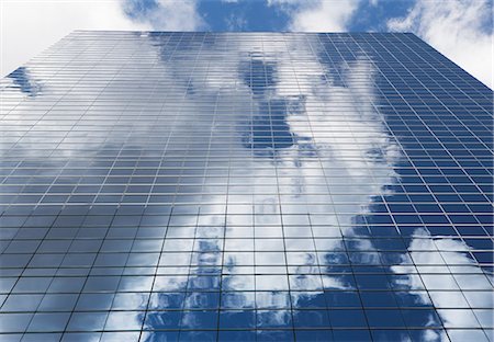 skyscrapers usa - Sky reflected in glass skyscraper Foto de stock - Sin royalties Premium, Código: 614-05818875