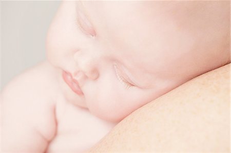 simsearch:614-07031844,k - Baby girl sleeping on shoulder Stock Photo - Premium Royalty-Free, Code: 614-05819050