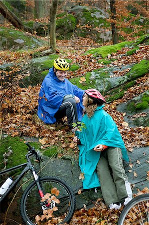 Mature couple in forest with bicycles Stock Photo - Premium Royalty-Free, Code: 614-06002098
