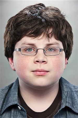 Portrait of young teenage boy wearing spectacles Foto de stock - Sin royalties Premium, Código: 614-06002203