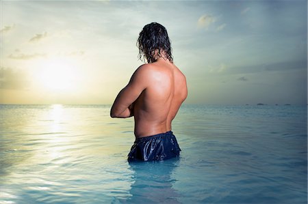 simsearch:614-05557077,k - Man standing in tranquil sea Stock Photo - Premium Royalty-Free, Code: 614-06002606