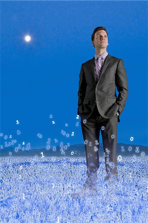 simsearch:614-06169336,k - Businessman standing in binary field Foto de stock - Sin royalties Premium, Código: 614-06044010