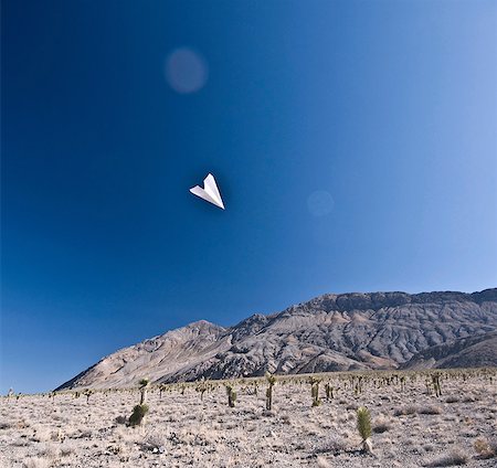 simsearch:700-03891190,k - Paper aeroplane in Death Valley National Park, California, USA Stock Photo - Premium Royalty-Free, Code: 614-06044085