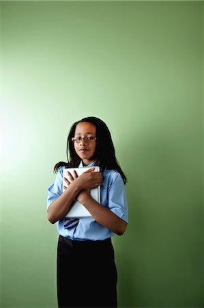 shy girl - Schoolgirl with digital tablet Stock Photo - Premium Royalty-Free, Code: 614-06116422