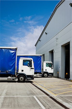 Truck parked outside distribution warehouse Stock Photo - Premium Royalty-Free, Code: 614-06169097
