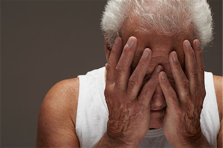 regret - Senior man with head in hands Stock Photo - Premium Royalty-Free, Code: 614-06169290