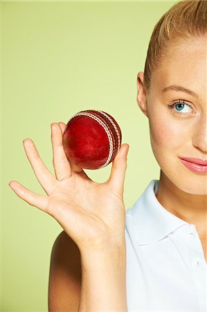 Young woman holding cricket ball Stock Photo - Premium Royalty-Free, Code: 614-06169479
