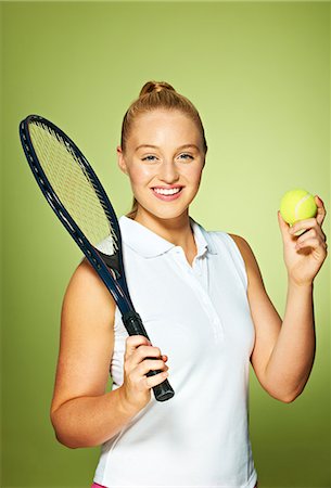 Young woman with tennis racket and tennis ball Stock Photo - Premium Royalty-Free, Code: 614-06169496