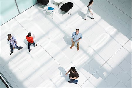 Man standing on office concourse Stock Photo - Premium Royalty-Free, Code: 614-06169574