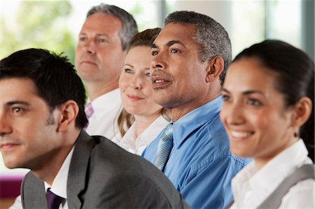 Businesspeople at presentation Stock Photo - Premium Royalty-Free, Code: 614-06311654