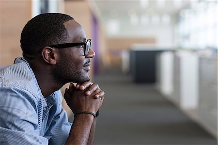 person thinking - Man with hand on chin, side view Stock Photo - Premium Royalty-Free, Code: 614-06311961