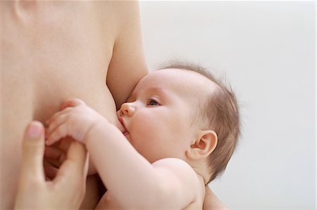 Mother breastfeeding baby Stock Photo - Premium Royalty-Free, Code: 614-06312010