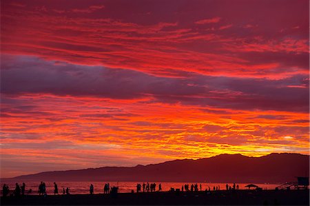 santa monica - People on beach at sunset, santa monica, california, usa Stock Photo - Premium Royalty-Free, Code: 614-06336204