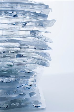 Stack of empty pill packets Stock Photo - Premium Royalty-Free, Code: 614-06336356