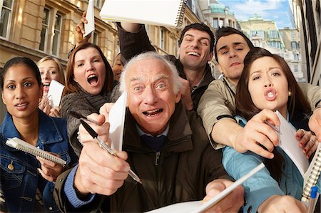 public - Group of people asking for autographs Stock Photo - Premium Royalty-Free, Code: 614-06402706