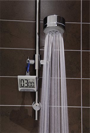 shower head - Shower with timer and running water Stock Photo - Premium Royalty-Free, Code: 614-06402951
