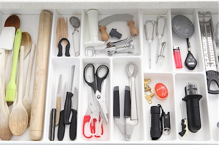 storage compartment - Utensils in kitchen drawer Stock Photo - Premium Royalty-Free, Code: 614-06402996